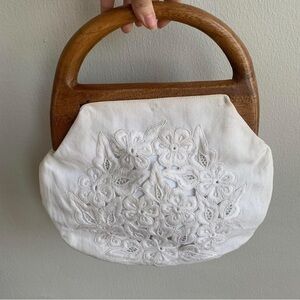 White Mini Purse with Wooden Handle and Cut Out Accents